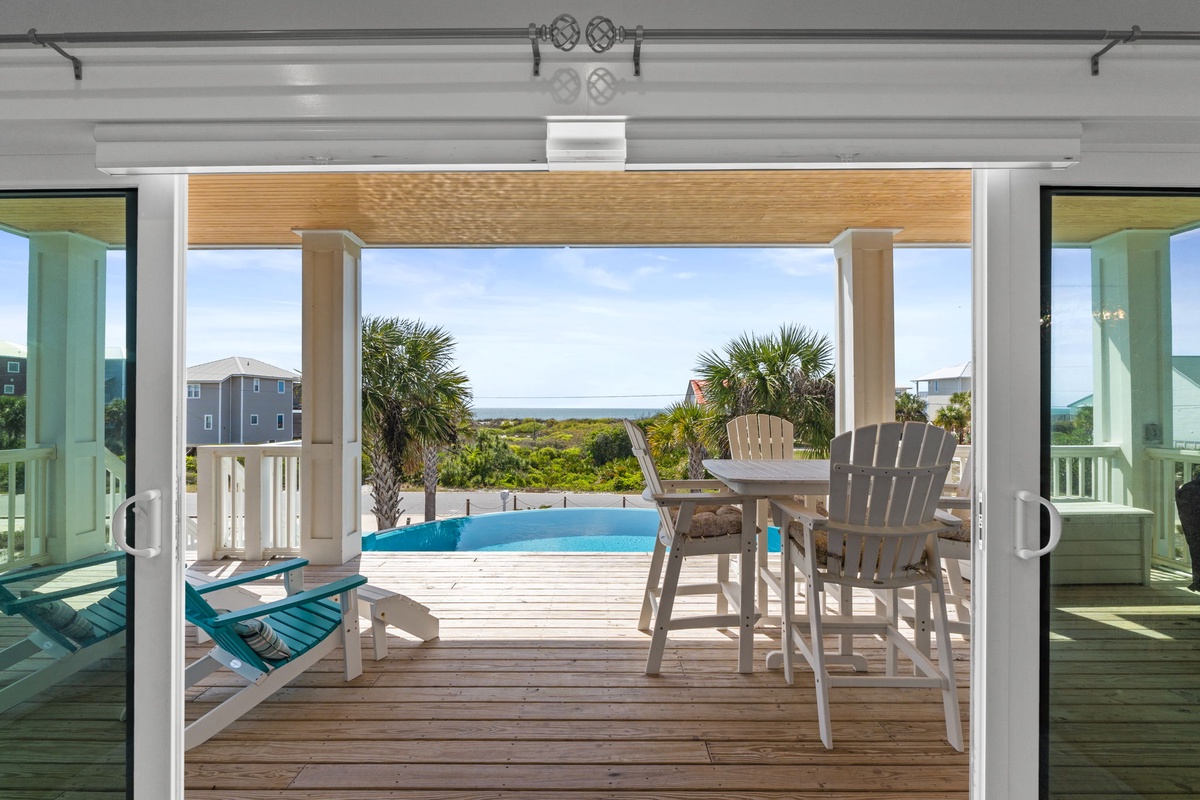 Step onto your private deck where coastal breezes meet infinity pool views, creating the perfect backdrop for morning coffee.