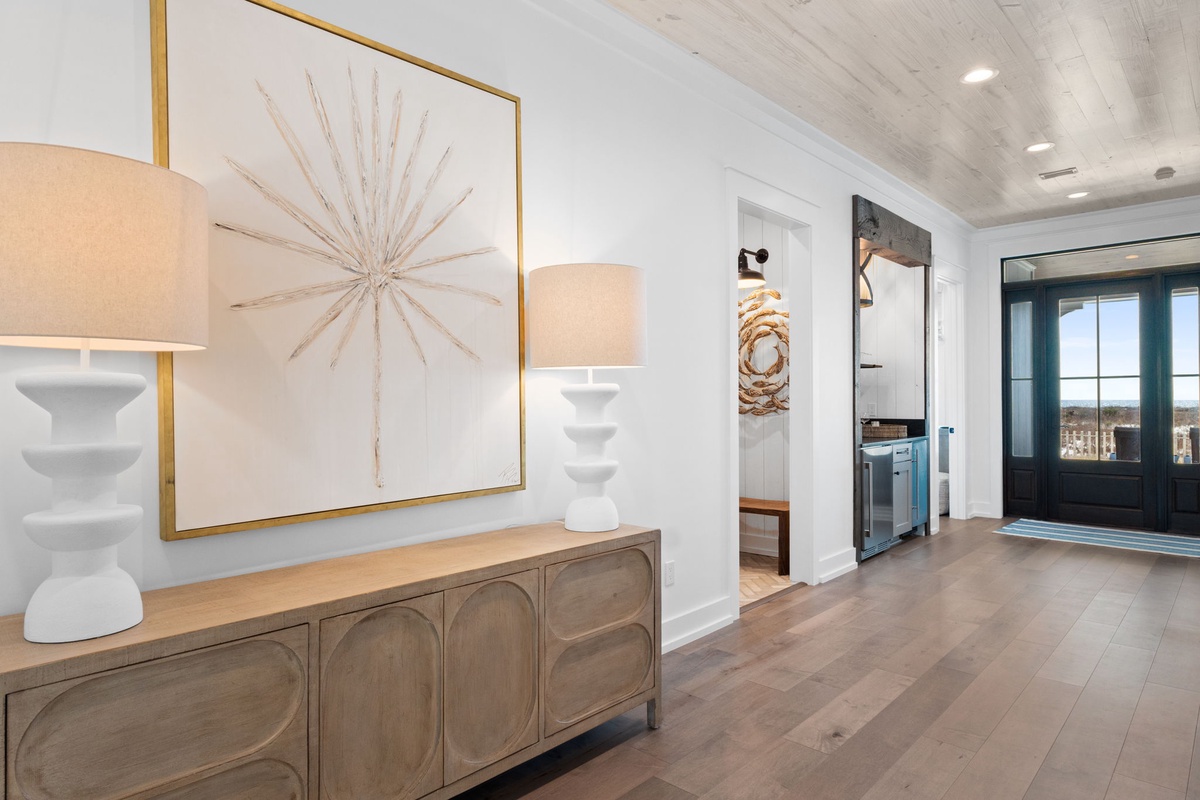 Step into your stylish living space with warm wood floors, elegant furnishings, and thoughtful decor that creates the perfect atmosphere for relaxation.