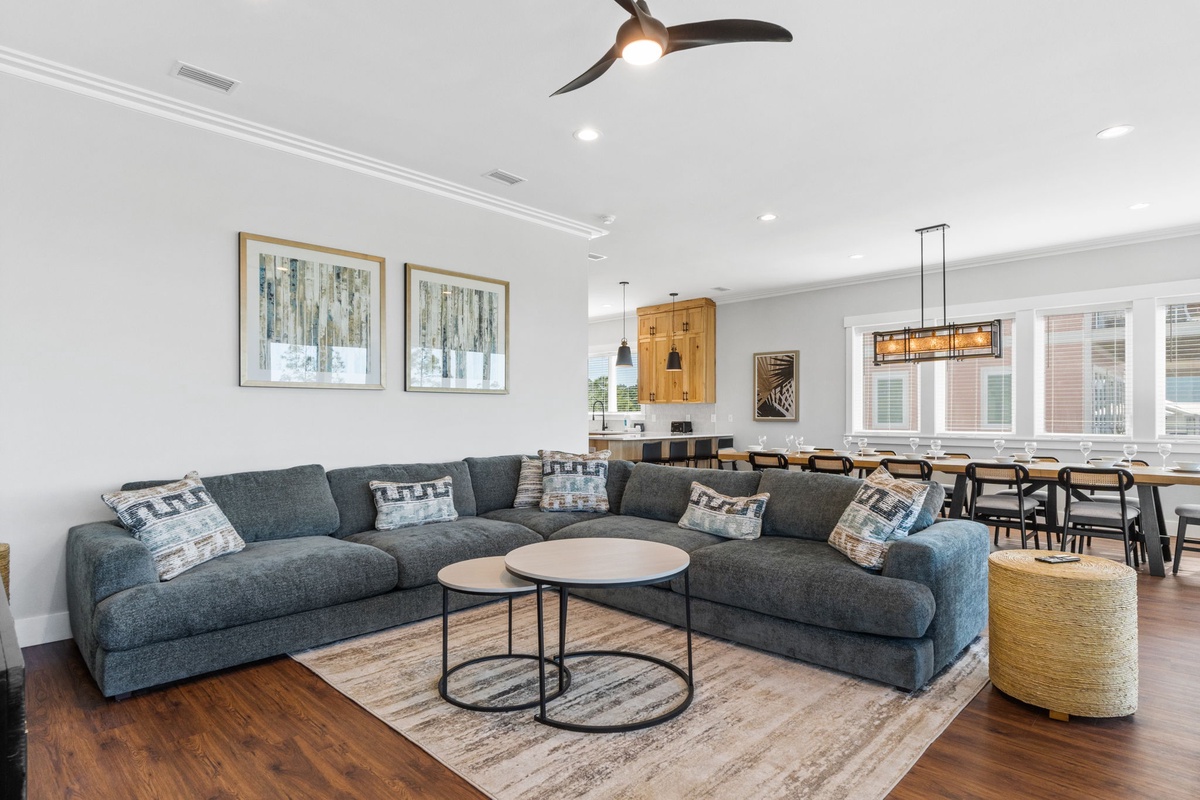 Sink into this plush sectional sofa where you can unwind after your adventures, surrounded by thoughtful artwork and natural light.
