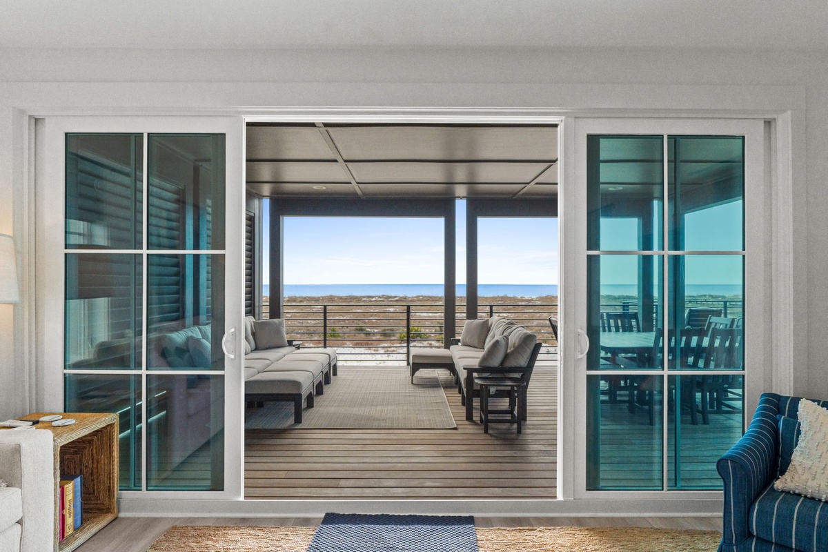 Step through sliding doors onto your private deck where ocean breezes and endless sea views create the perfect retreat.