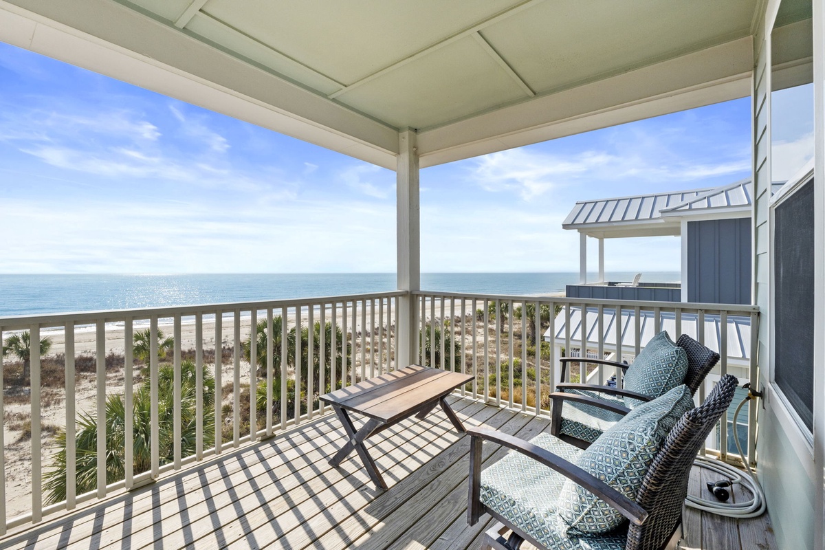 Relax on your private balcony with stunning ocean views and comfortable seating—the perfect spot for morning coffee or sunset cocktails.
