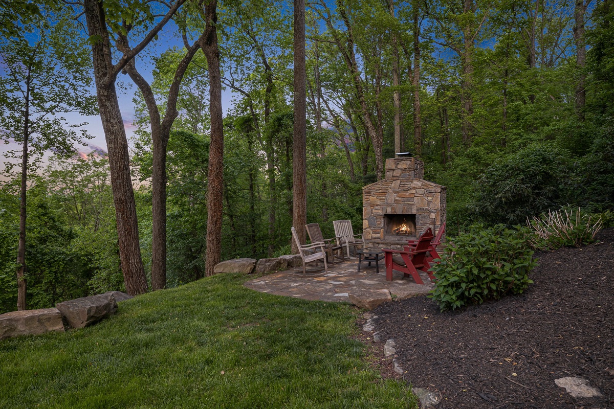 Enjoy Natural Surroundings at the Outdoor Fireplace Patio