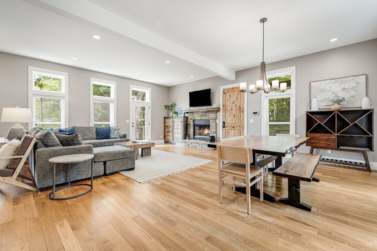 Living Area w/ Modern Decor, Wood Fireplace & Open Floorplan