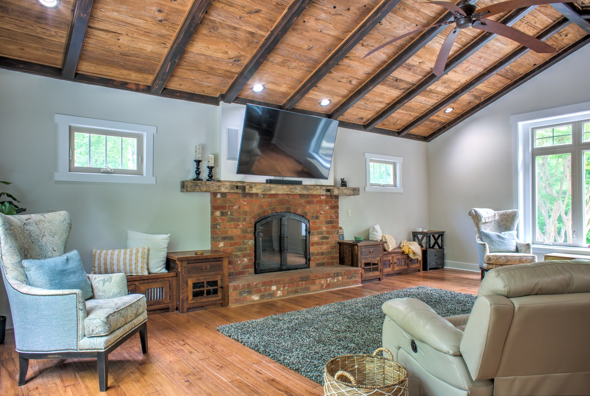 Gather Under the Vaulted Ceilings By the Wood Fireplace