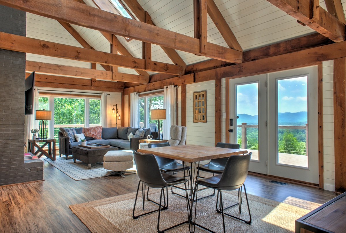 Open Floorplan, Wood Beam Ceiling, and Modern Decor