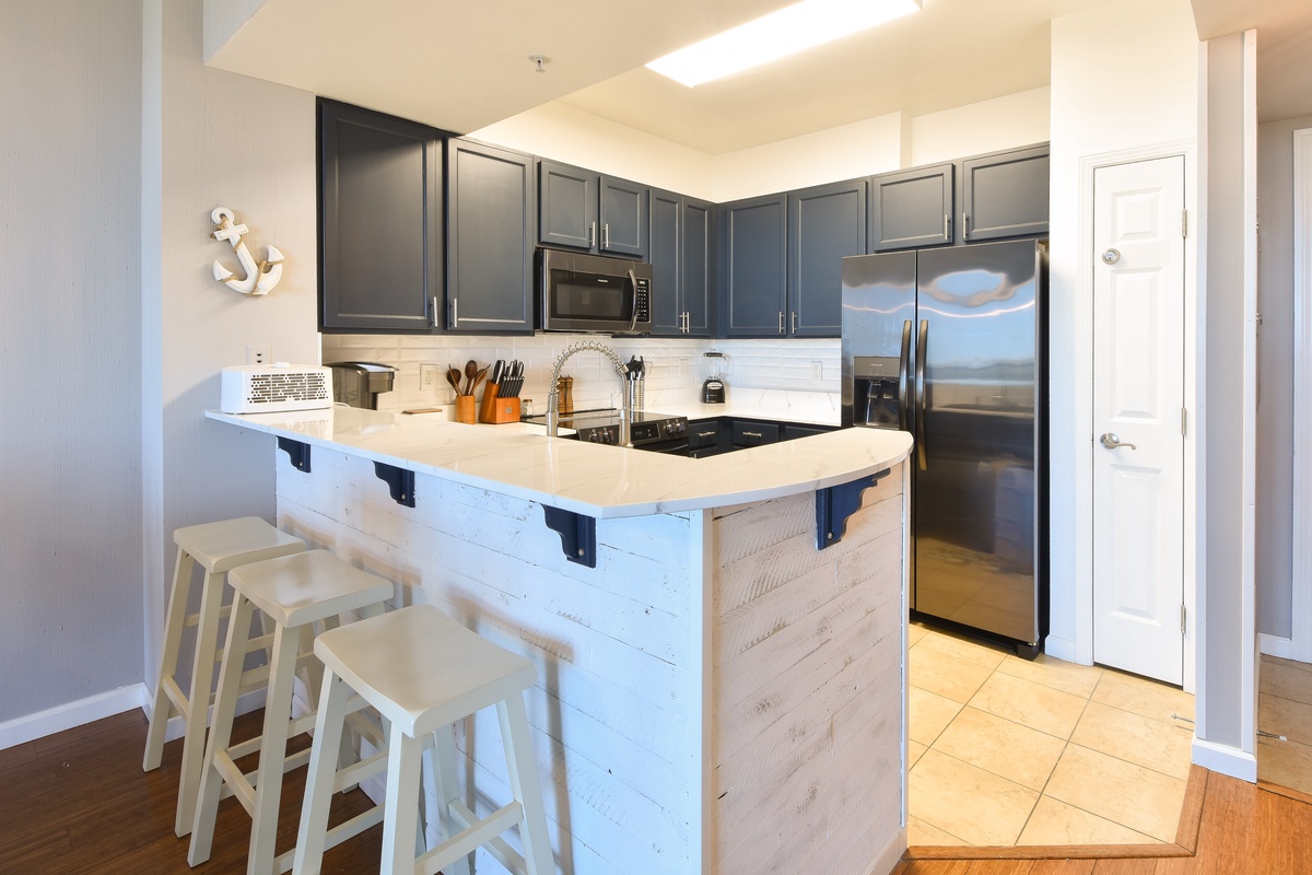 The Palms of Destin 2906 - Breakfast Bar and Kitchen Area