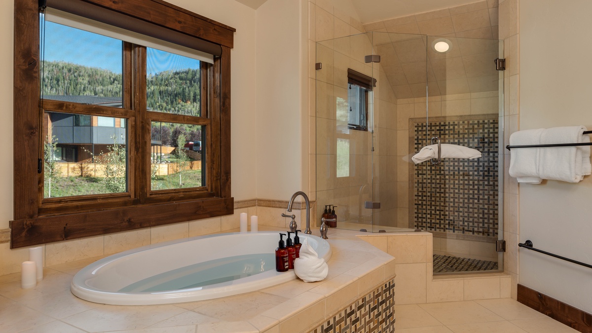Bedroom 1, Uppermost Level - Primary ensuite with soaking tub and glass shower