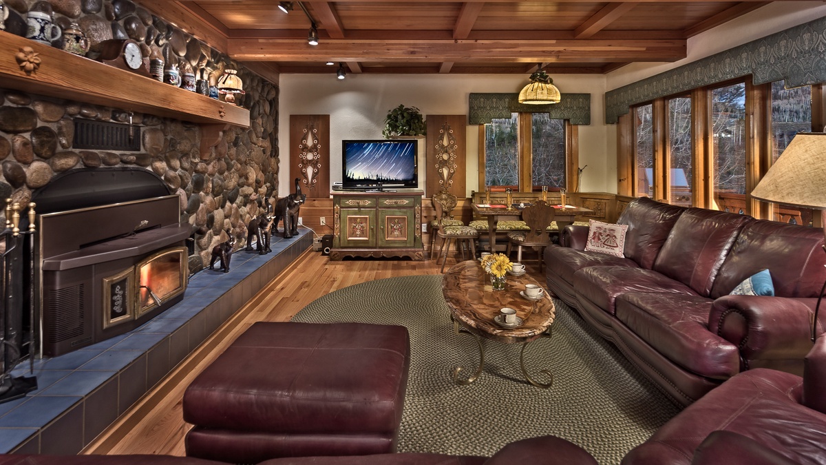 Great room has a flat screen TV and lots of cozy seating