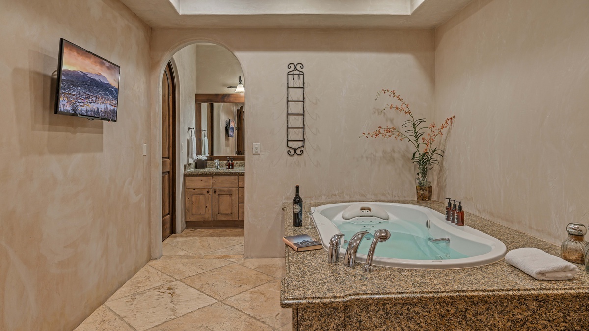 Bedroom 1, Upper Level - Primary king ensuite with large tub, and his and hers bathroom suites