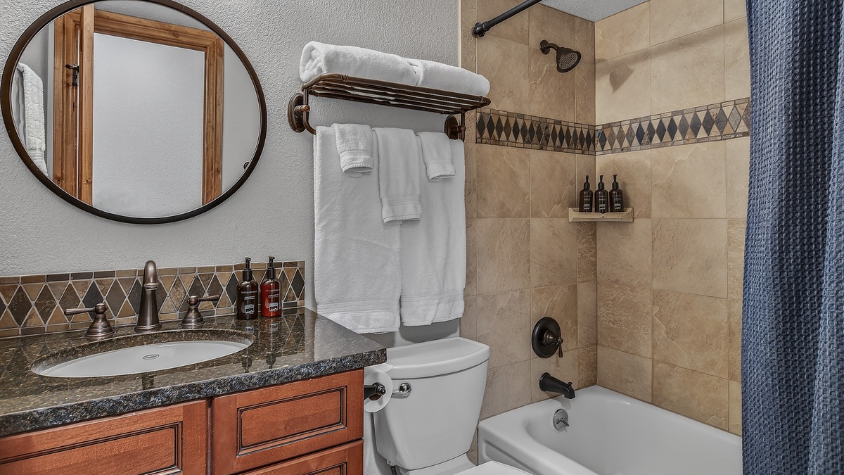 Shared Bathroom, Main Level - Hall bathroom adjacent to Bedroom 2
