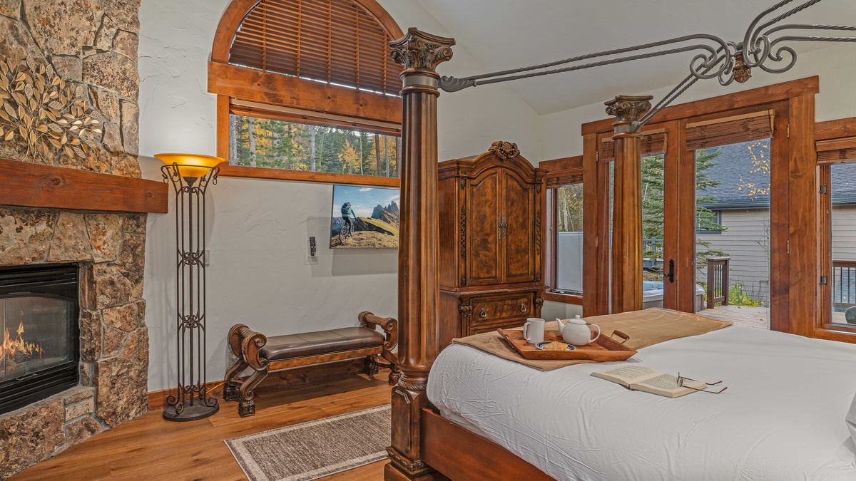 Bedroom 1, Main Level - Primary king suite on main level with fireplace and back patio access