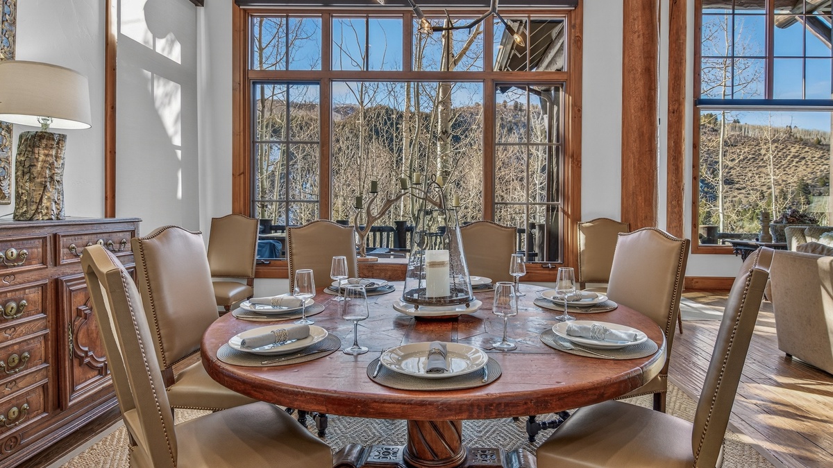 Dining Area, Main Level - Round dining table with mountain views