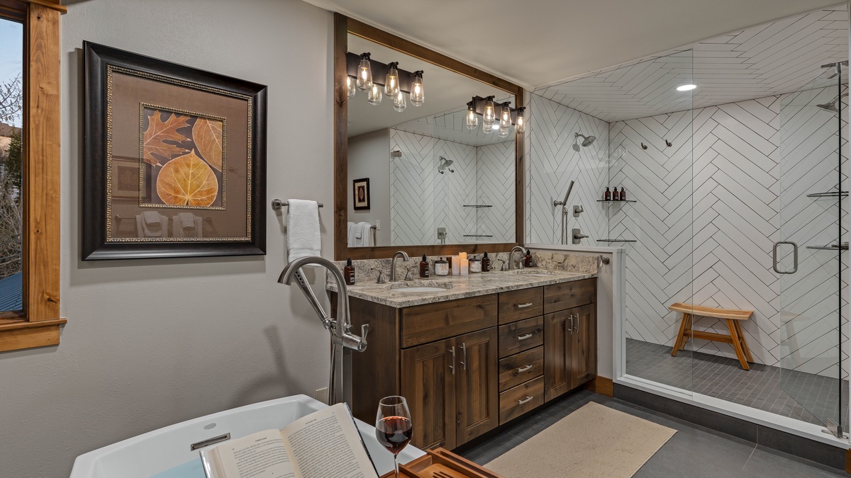 Bedroom 1, Upper Level - Primary king ensuite with double vanity, soaking tub, and glass walk-in shower