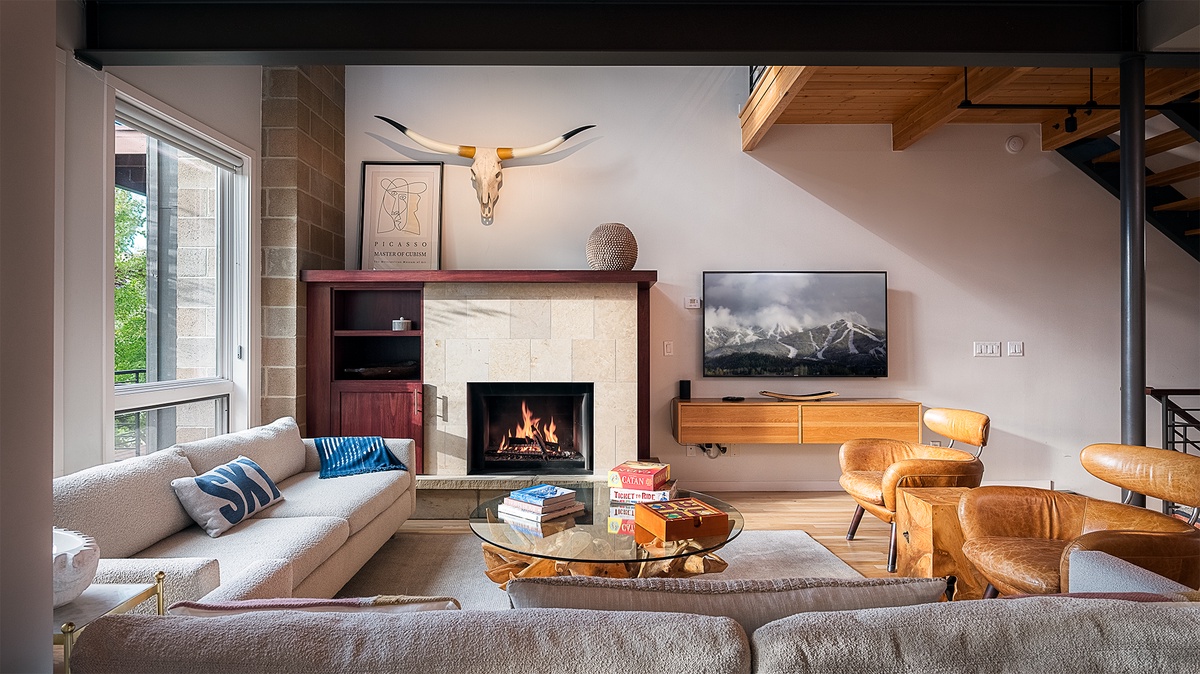 Great Room, Main Level - Gas fireplace with TV and seating area