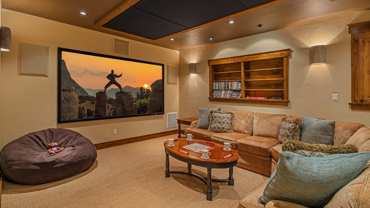 Theater screen and cozy seating in lower level family room