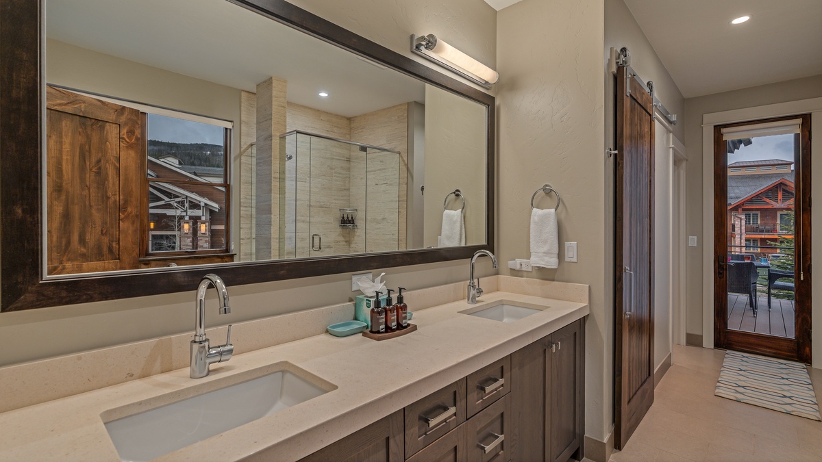 Bedroom 1, Main Level - Primary ensuite on main level with deck access