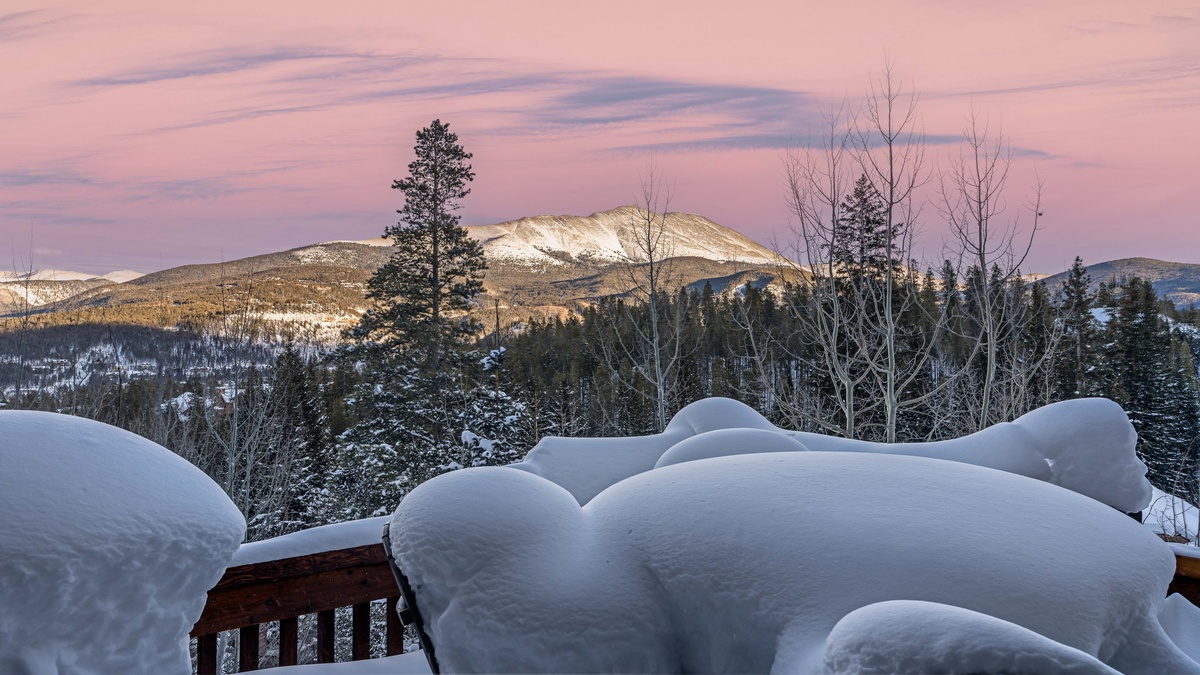 Snowy winter views off the main level deck