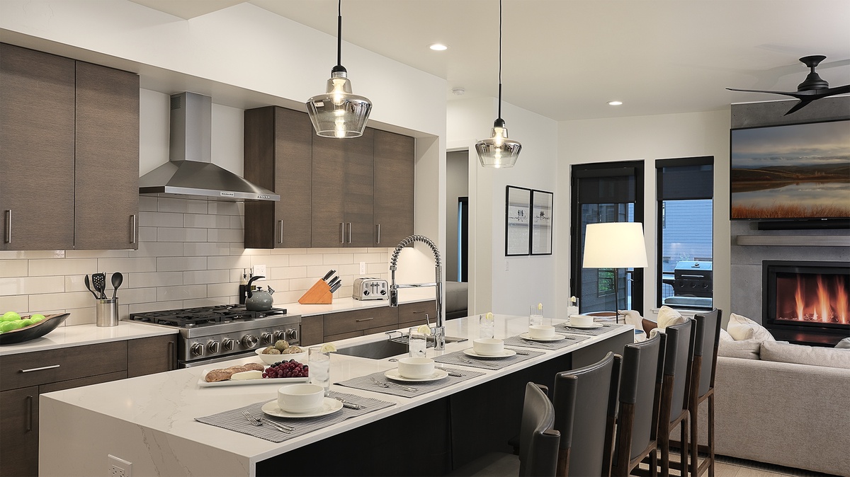 Kitchen, Main Level - Modern kitchen with oversized island seating and open layout to the great room
