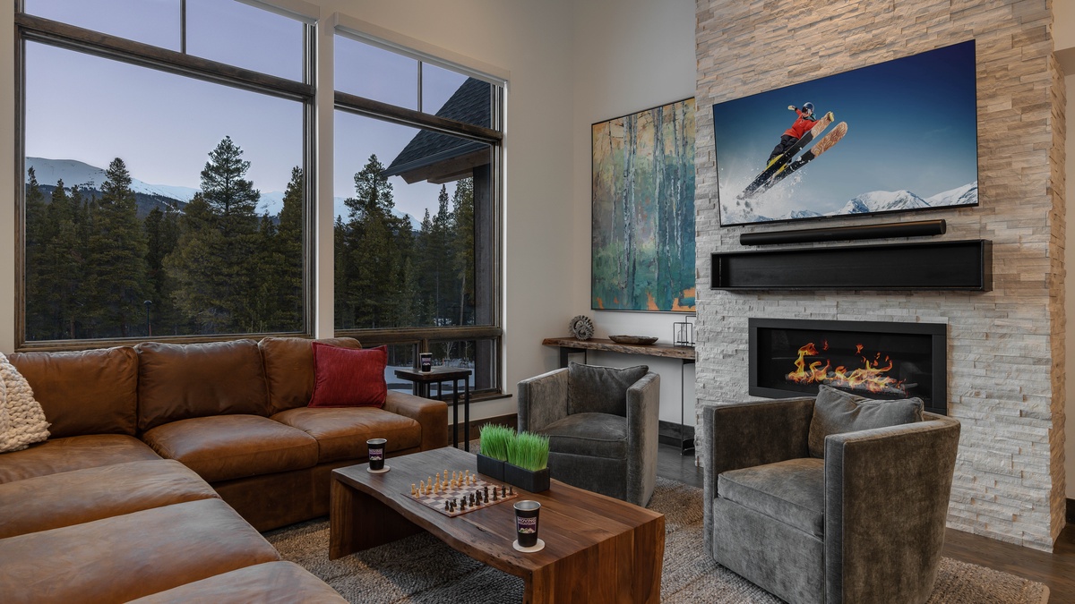 Great room with TV and fireplace