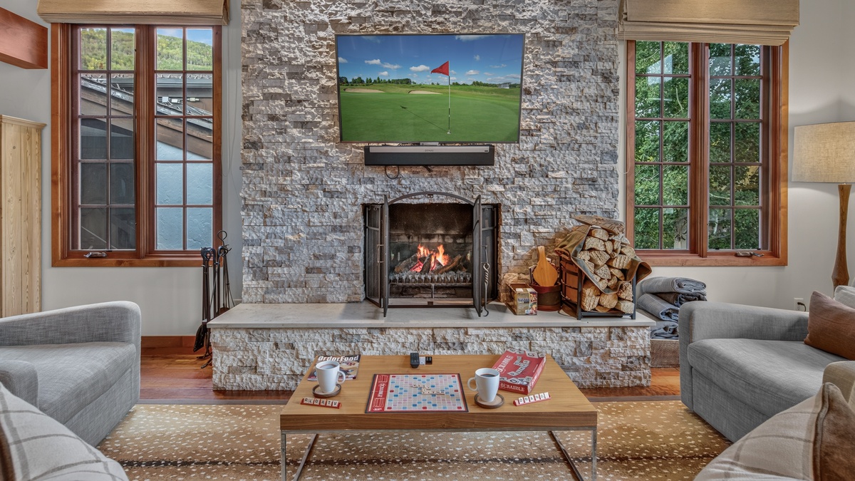Great Room, Main Level - Fireplace with TV and seating area