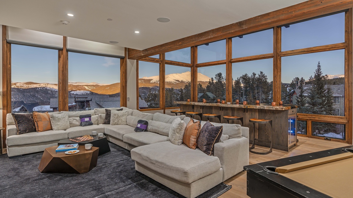 Spectacular family room with high-top bar and views all around