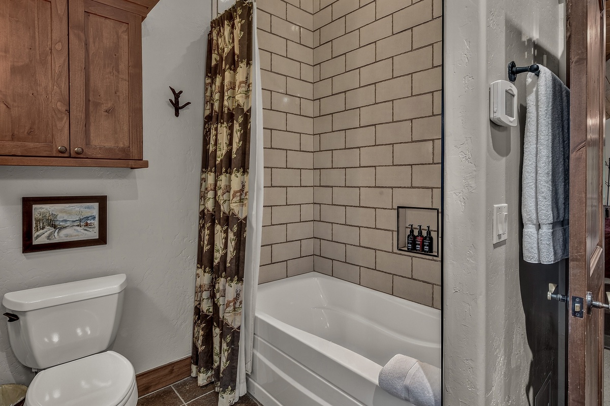 Bedroom 1, Upper Level - Primary ensuite with shower/tub combo