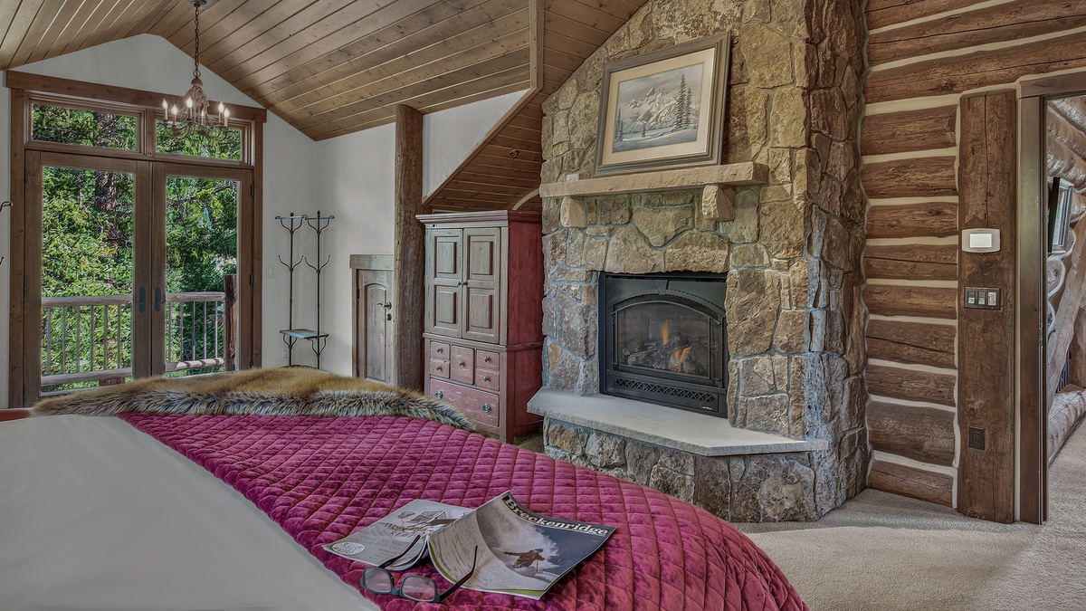 Bedroom 1, Upper Level - Primary king bedroom with fireplace