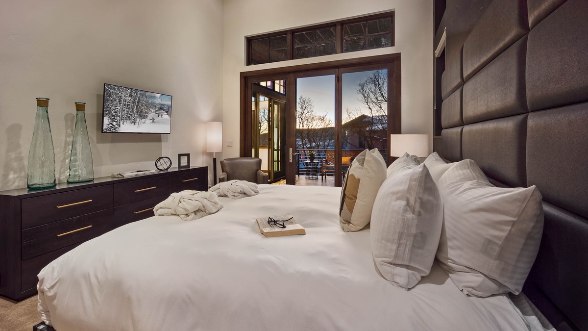 Lower level king suite with TV and deck access