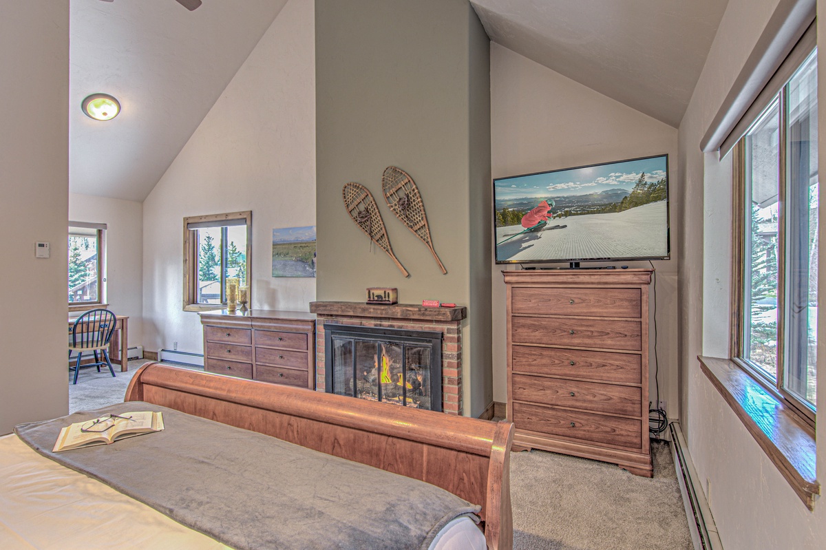 Bedroom 1, Main Level - Primary bedroom with fireplace