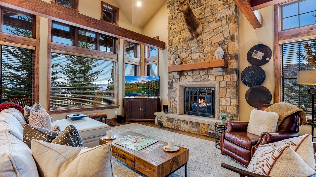 Great Room, Main Level - With stone fireplace and panoramic views