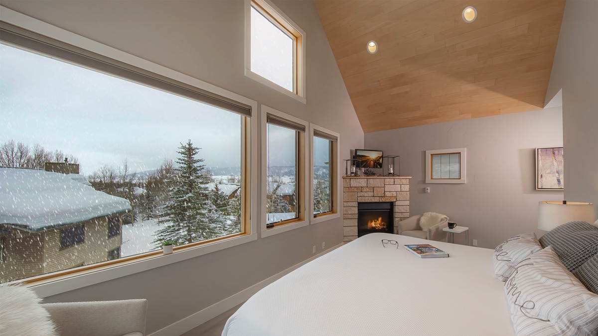 Bedroom 1, Main Level - Primary king bed with cozy fireplace