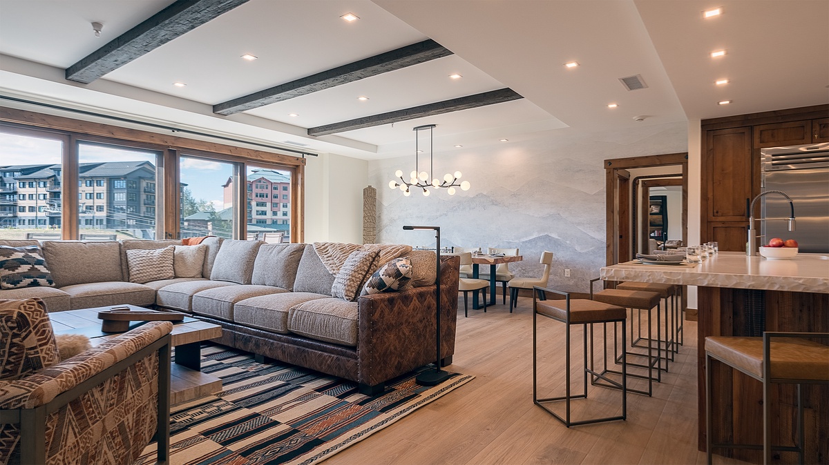 Great Room, Main Level - Seating area beside dining area with mountain views