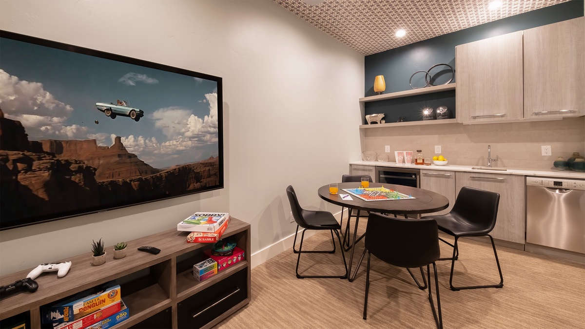Family Room, Lower Level - Wet bar with counter, sink and shelving