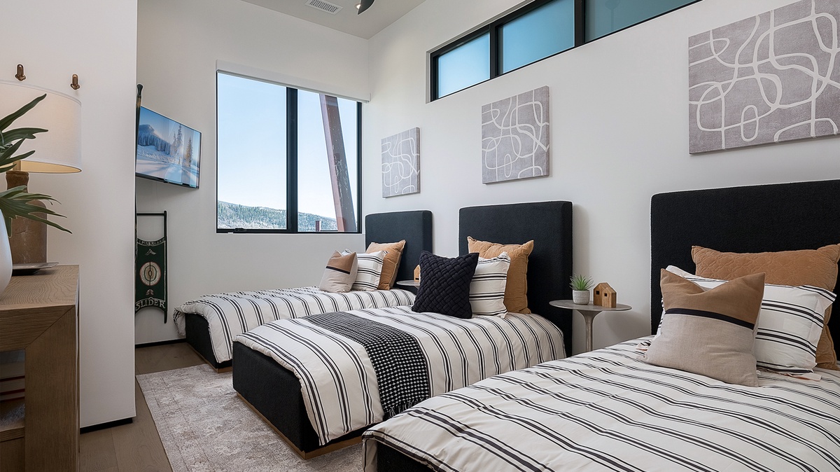 Bedroom 2, Lower Level - Three twin beds