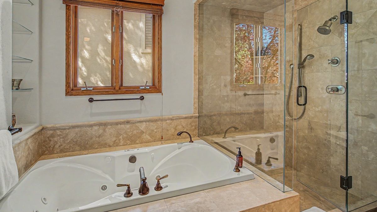 Bedroom 1, Main Level - Primary ensuite with soaking tub