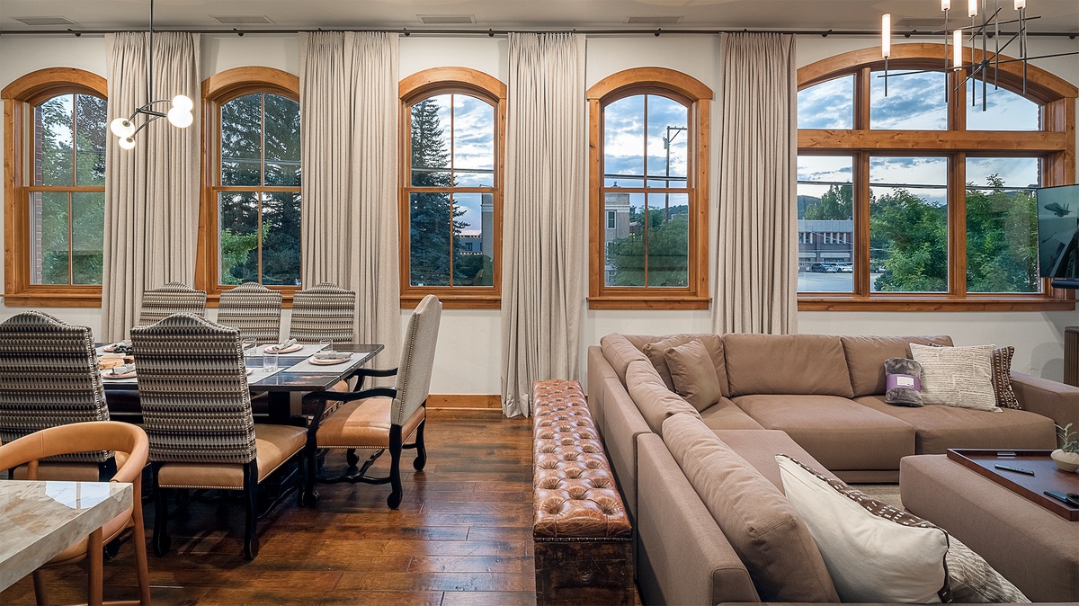 Great Room, Main Level - Seating area beside dining area with mountain views