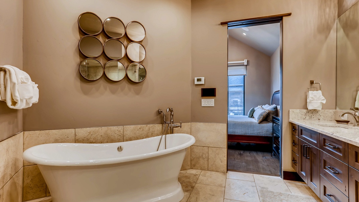 Bedroom 1, Upper Level - Primary ensuite with soaking tub
