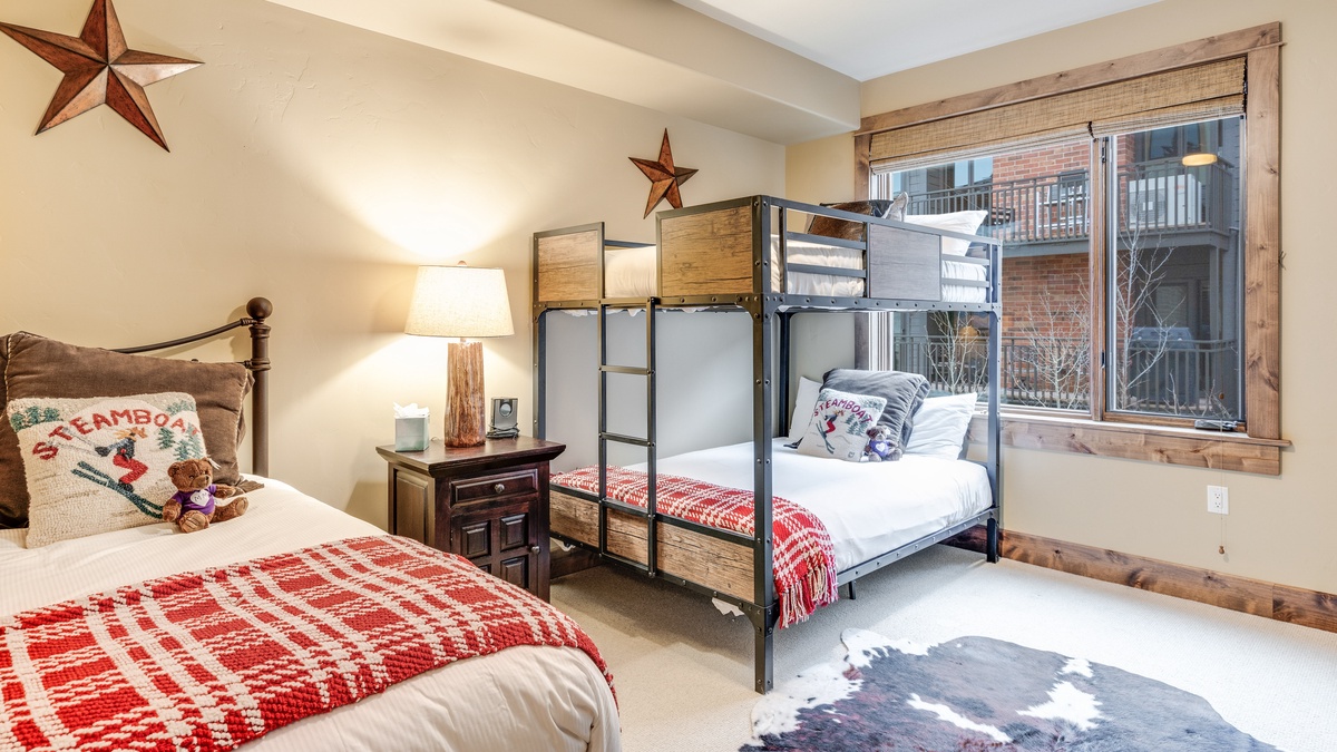 Bedroom 2, Main Level - Full-over-full bunk bed and twin bed