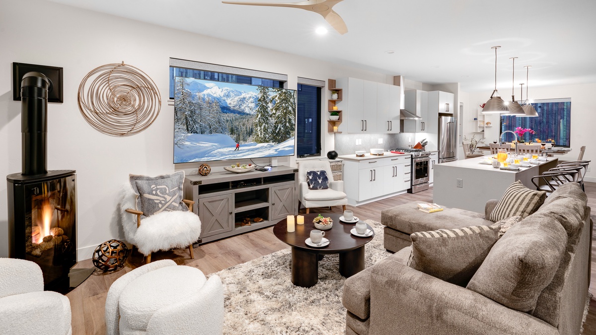 Great Room, Main Level - Open-concept living area with fireplace and kitchen