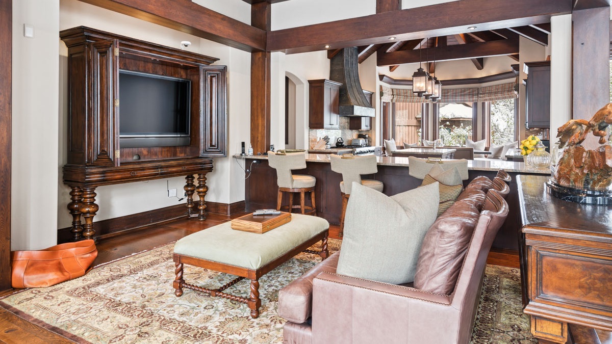 Catch the morning news in this den adjacent to the kitchen