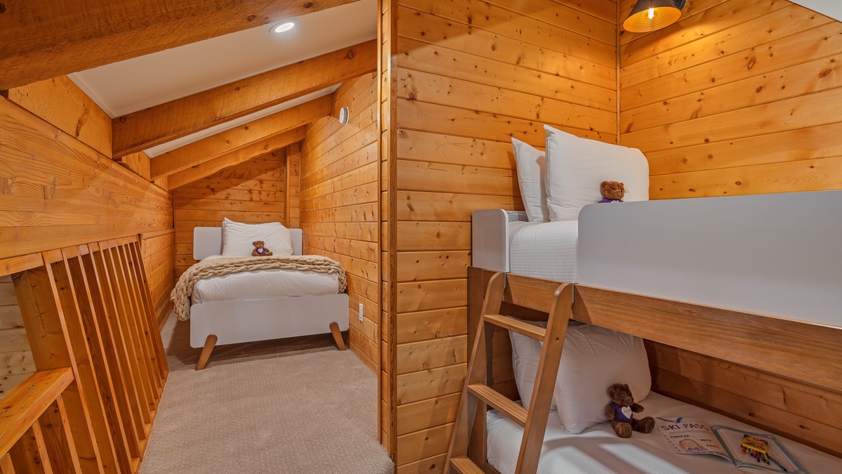 Loft above the queen/full bedroom with a twin bunkbed and single twin