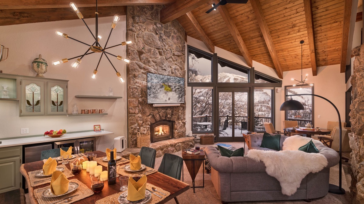 Great Room, Main Level - Floor-to-ceiling windows with fireplace and cozy seating
