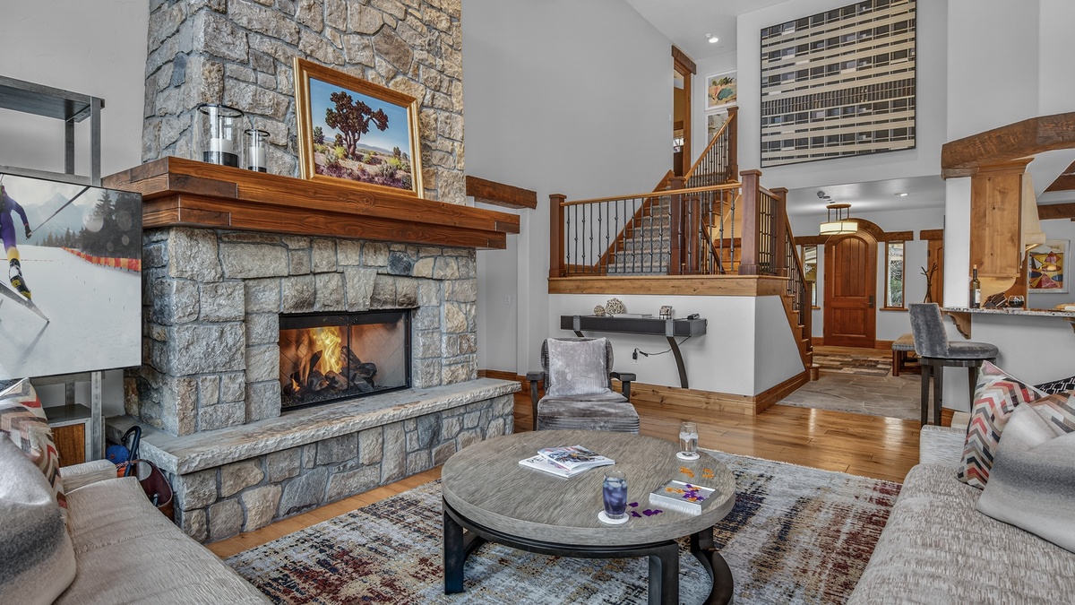 Great Room, Main Level - With stone fireplace and cozy seating area