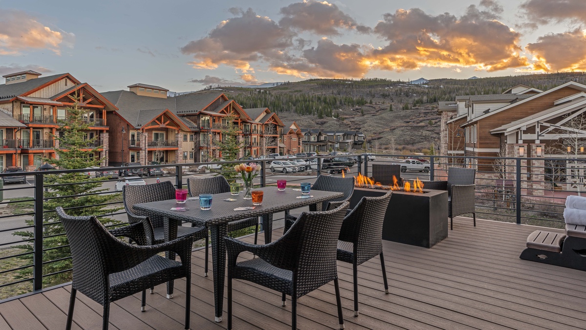 Main level deck with gas fireplace, hot tub, and gas grill