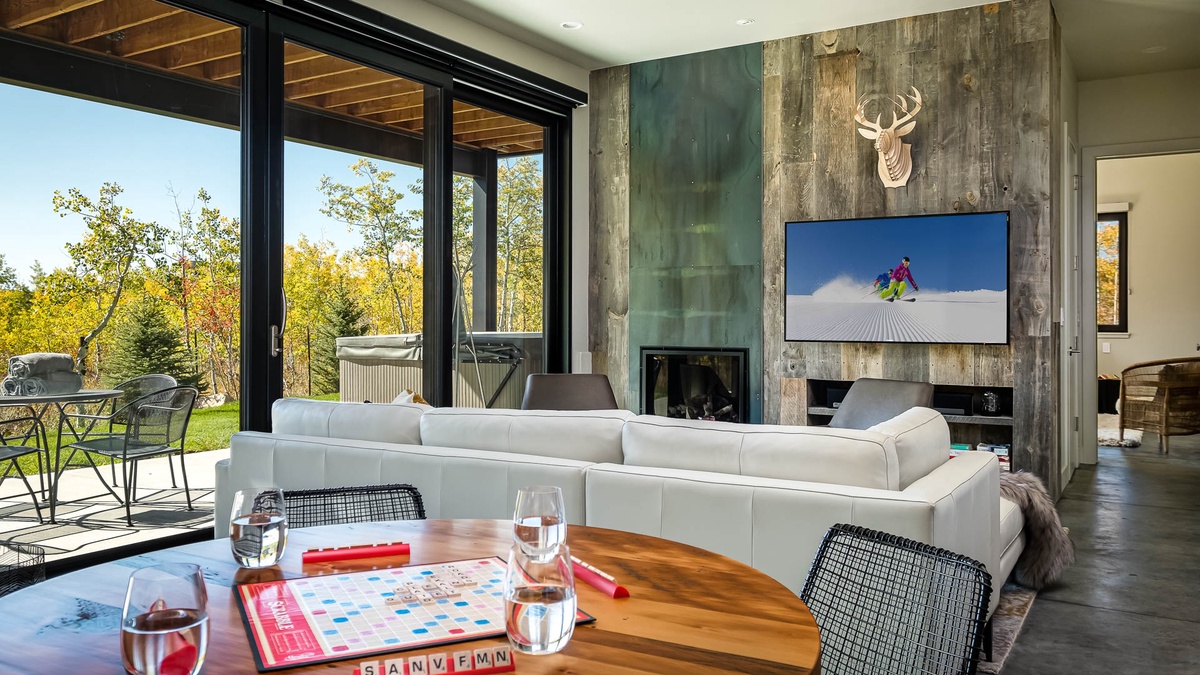 Family Room, Lower Level - Cozy living area with direct access outdoors.