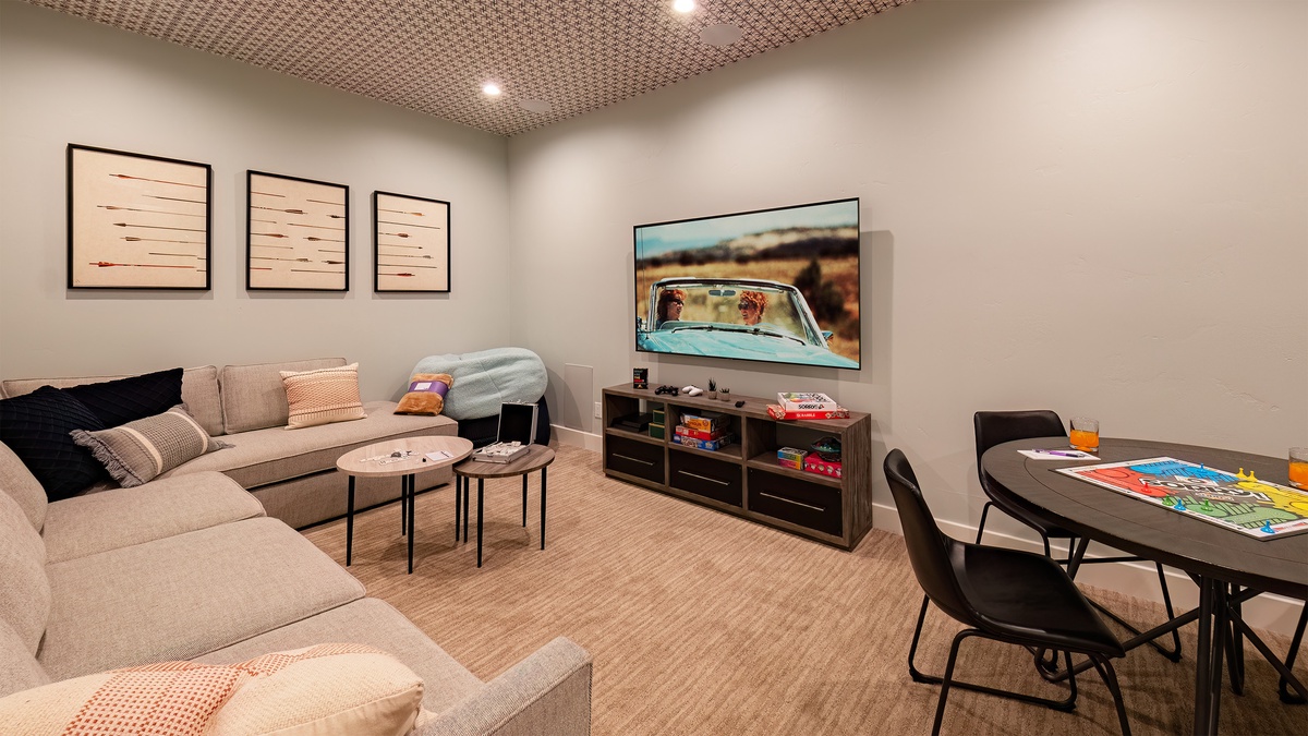 Family Room, Lower Level - Seating area with TV and chairs