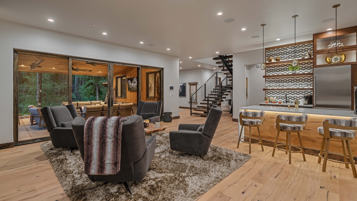 Lower level family room and wet bar with back patio access