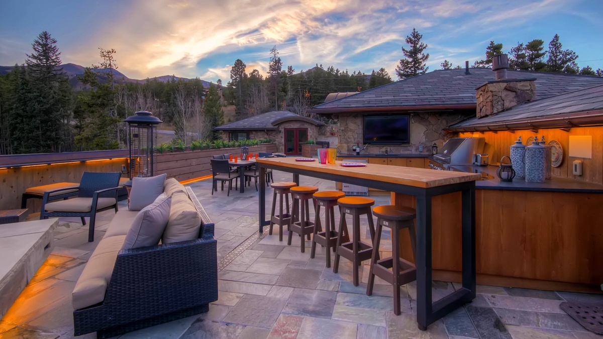 Rooftop patio seating area in summer