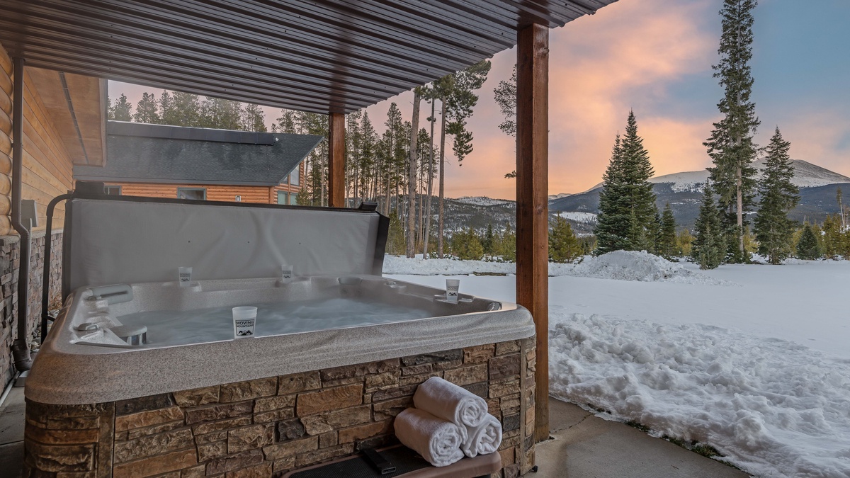 Soak away your sore muscles in this private hot tub after a day on the mountain