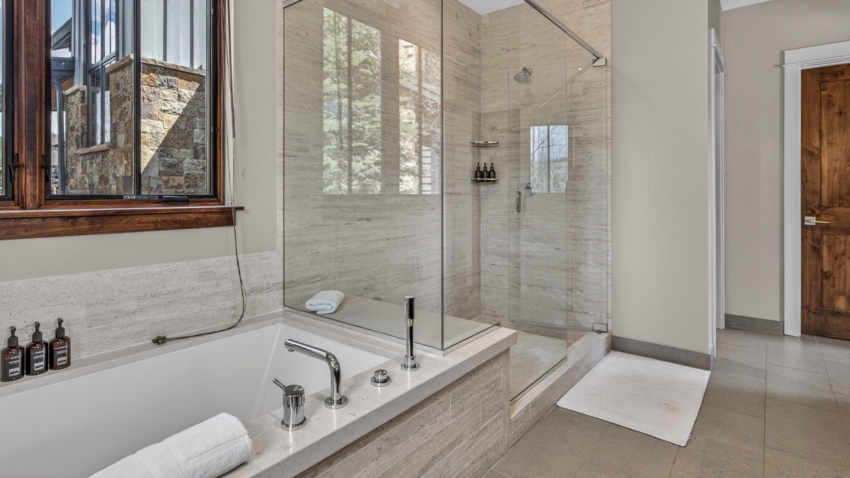 Bathroom 1, Main Level - Ensuite bathroom with soaking tub and walk in shower